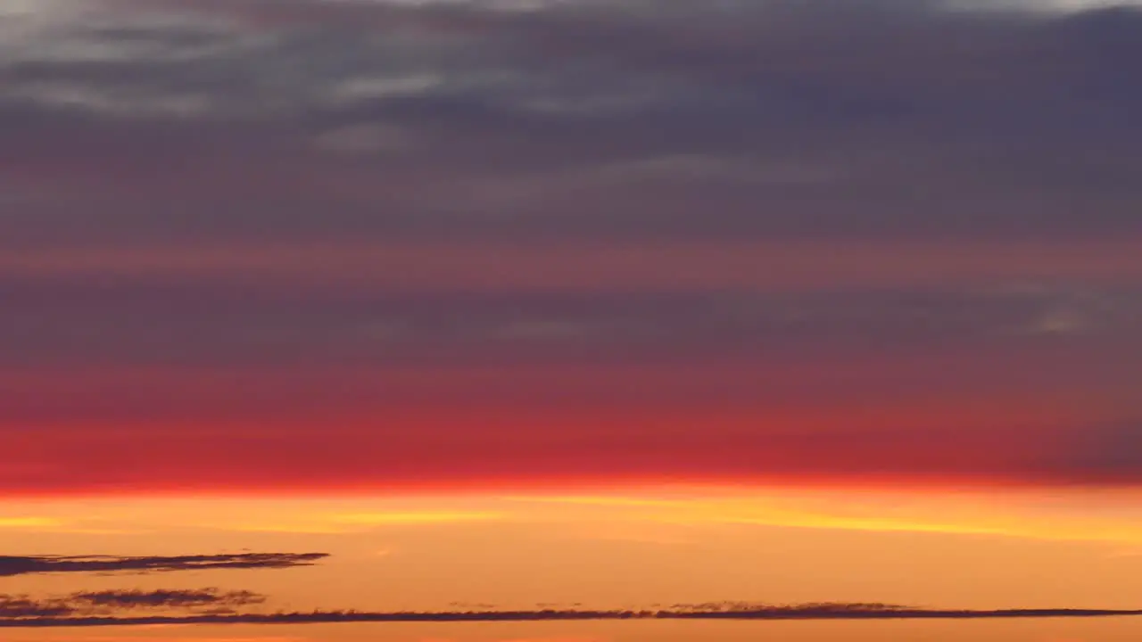 Timelapse Of Orange Sunset With Clouds Moving In The Sky