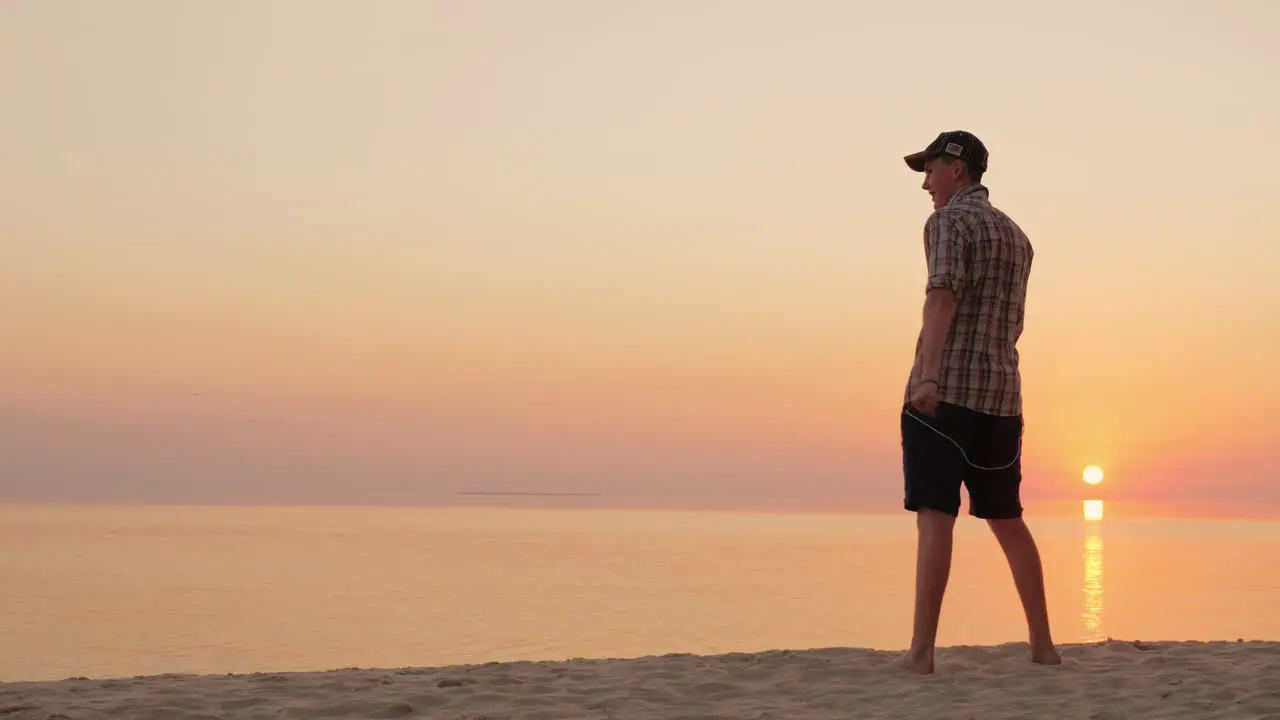 A Teenager Dancing A Funny Dance On The Beach 4K Video