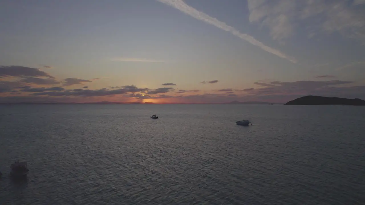 Boats Floating In The Sea Near The Great Keppel Island At Sunset In The Keppels QLD Australia