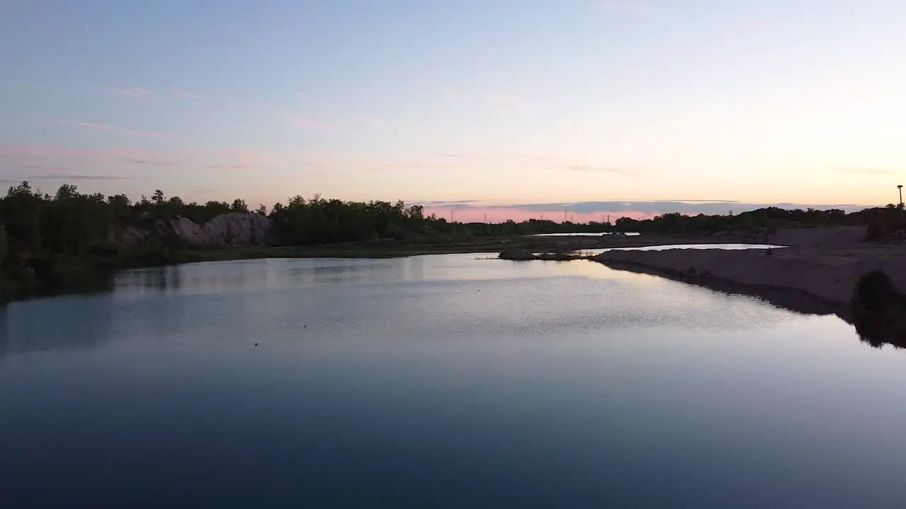 Aerial Shot of Quarry Lake During Twilight