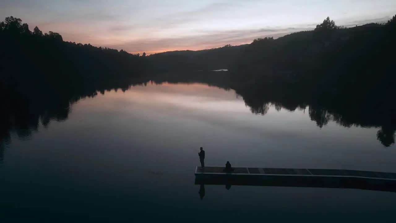 Aerial view of people enjoying the sunset at the river