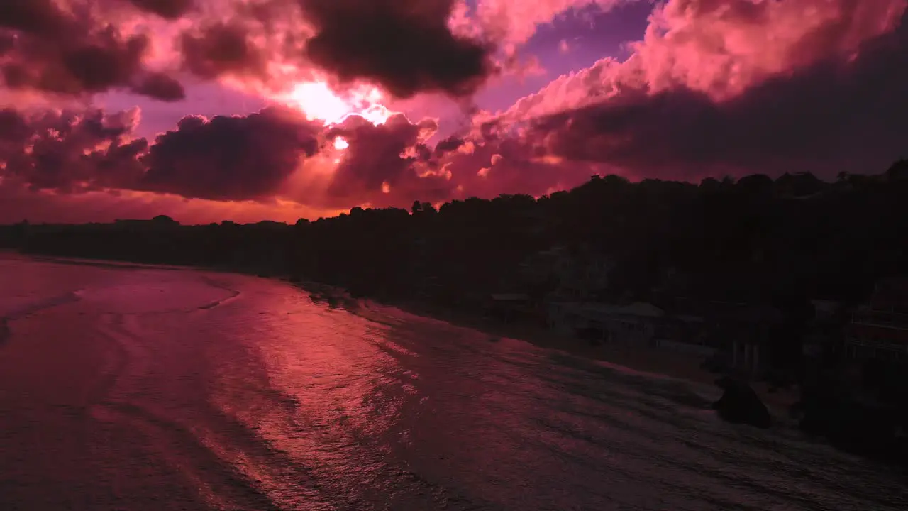 amazing orange sunrise in Bali drone aerial view of the bali coastal beach line while the sun is rising