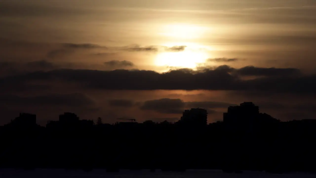 Close up of Silhouette of city with beautiful sunset on background