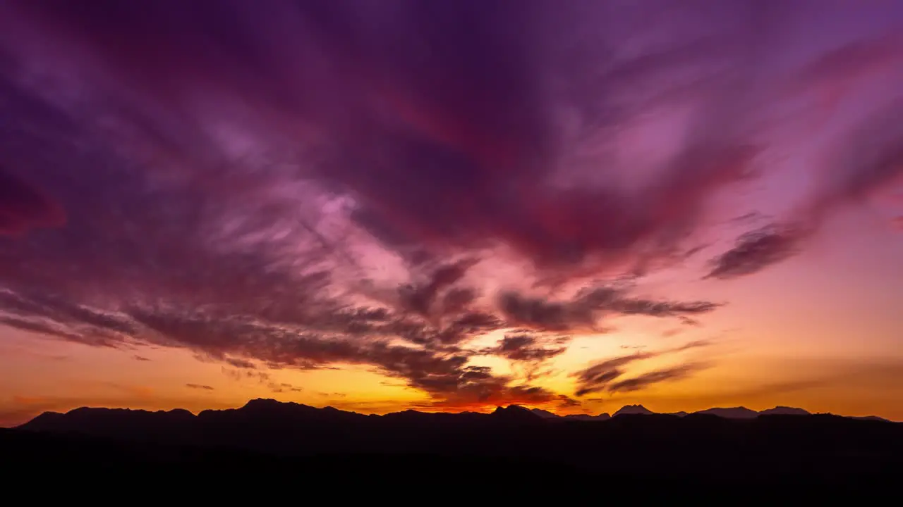 Sunset motion time lapse with mountain silhouettes and beautiful purple orange colors movement is done with gimbal filmed in Ronda Malaga Spain amazing 4k footage