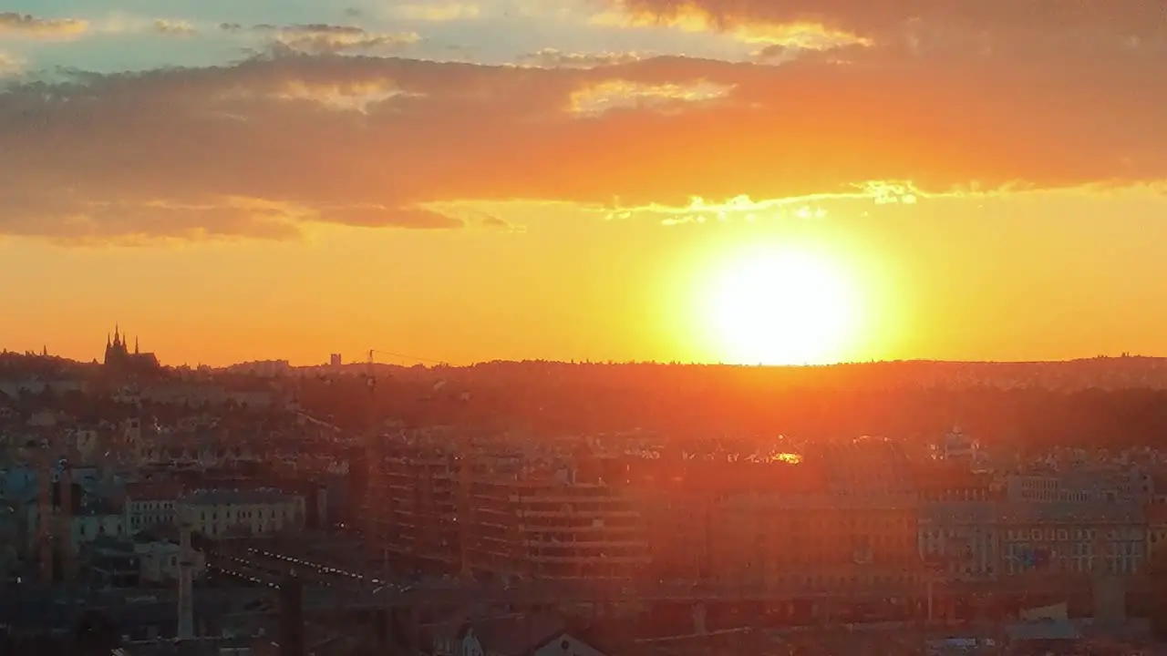 Drone Flight Over Prague Skyline at sunset with the Prague Castle