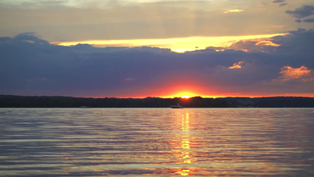 Sunset At Beach With Boat