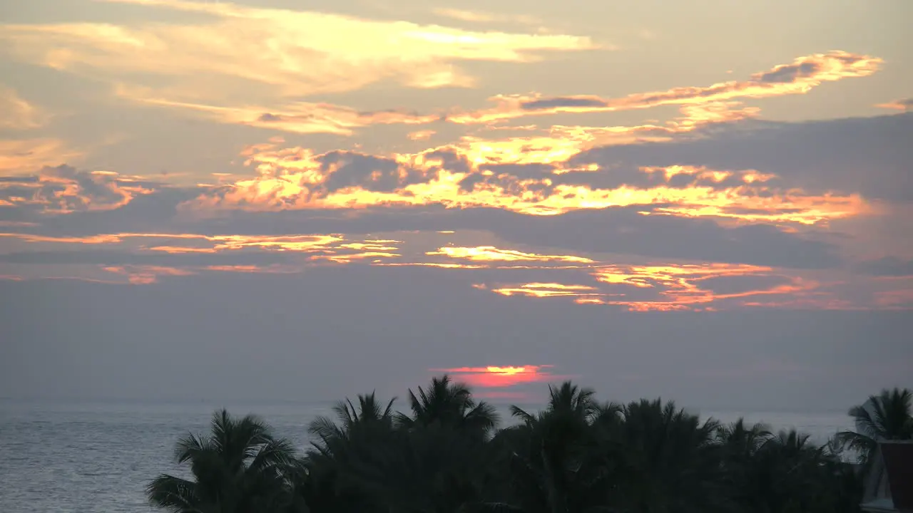 Florida Key West Sunset Through Clouds Over Palms