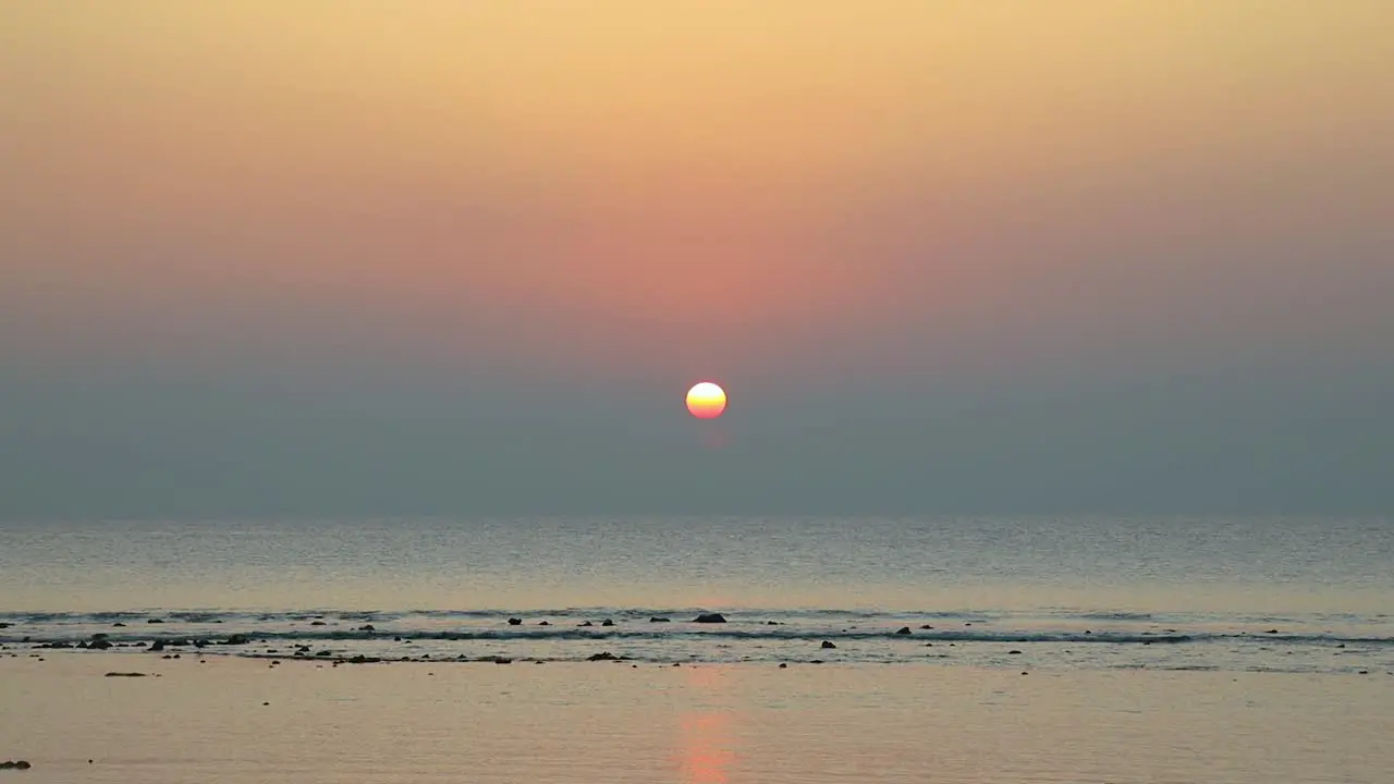 Sunset over the ocean at Lakshmanpur beach no 1 and sunset point on Neil Island on Andaman and Nicobar Islands India