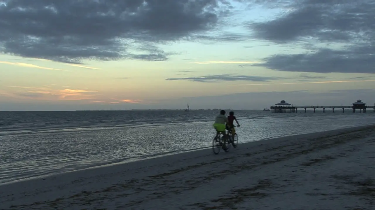 Florida Bikers on beach at sunset