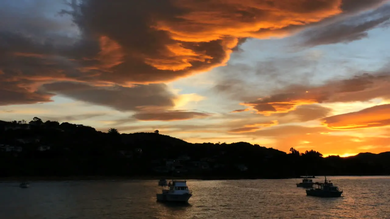 New Zealand Moeraki Sunset Orange Clouds Pan