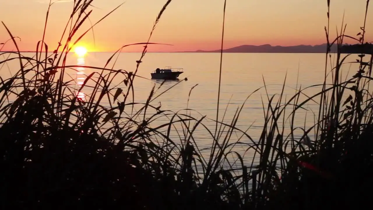 Anchored Boat at Sunset