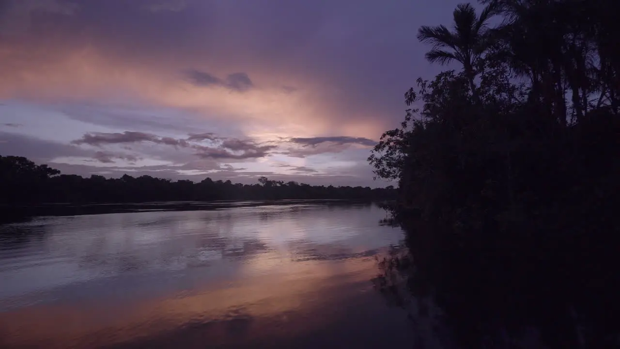 Beautiful night sky over river Amazon with moody reflections