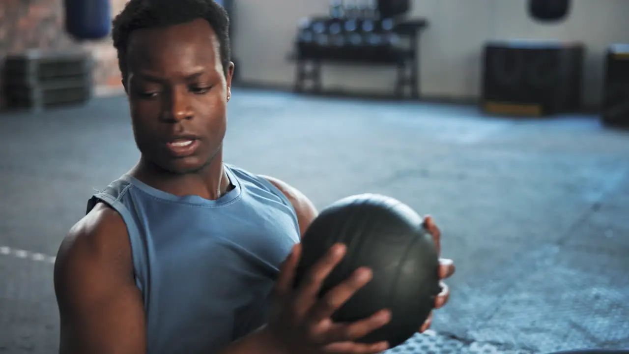 Fitness gym and black man on floor with medicine