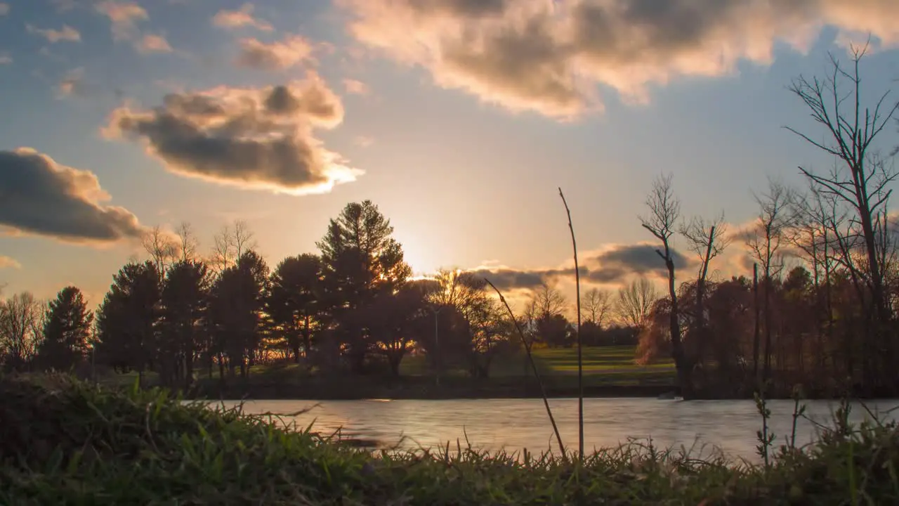 Golden Fire Sunset Timelapse in Blacksburg Virginia with orange and red near pond