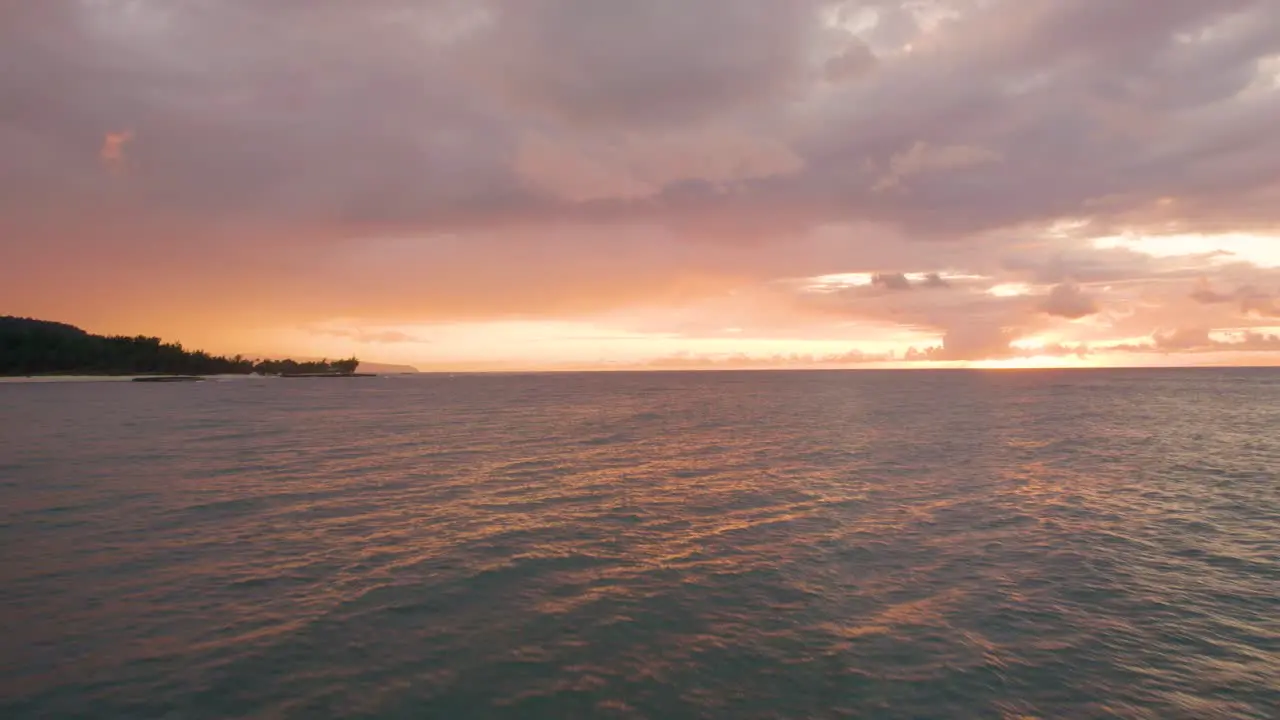 Drone Flight Over Notable Surfing Spot In The North Shore Of Oahu In Hawaii On A Dramatic Sunset