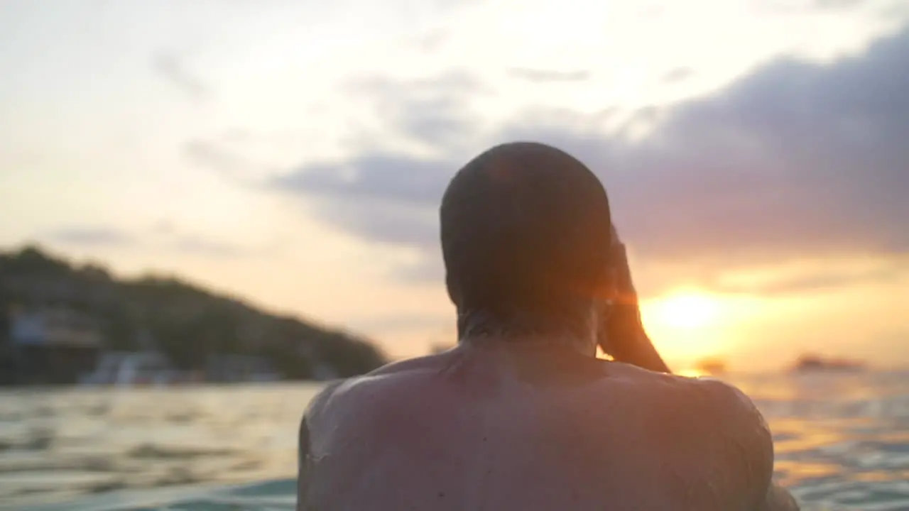 Swimmer Emerging From the Sea at Sunset