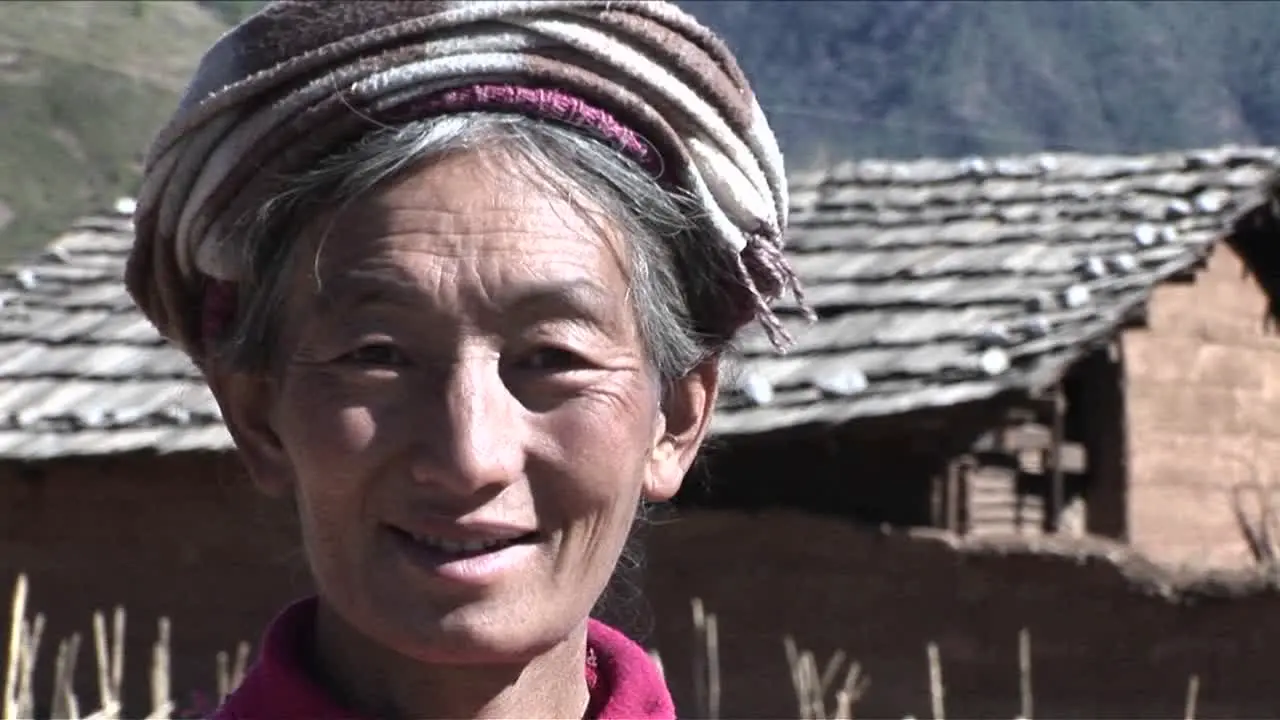 A smile tribal person smiles at camera