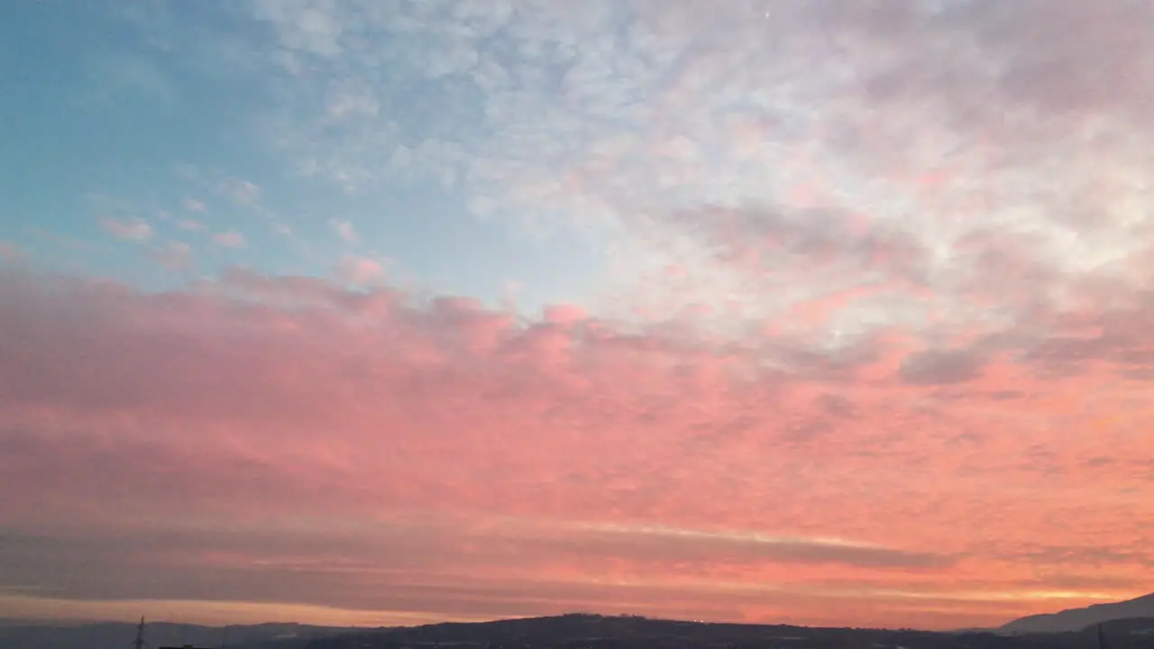 View of beautiful red clouds and sunset over the mountain