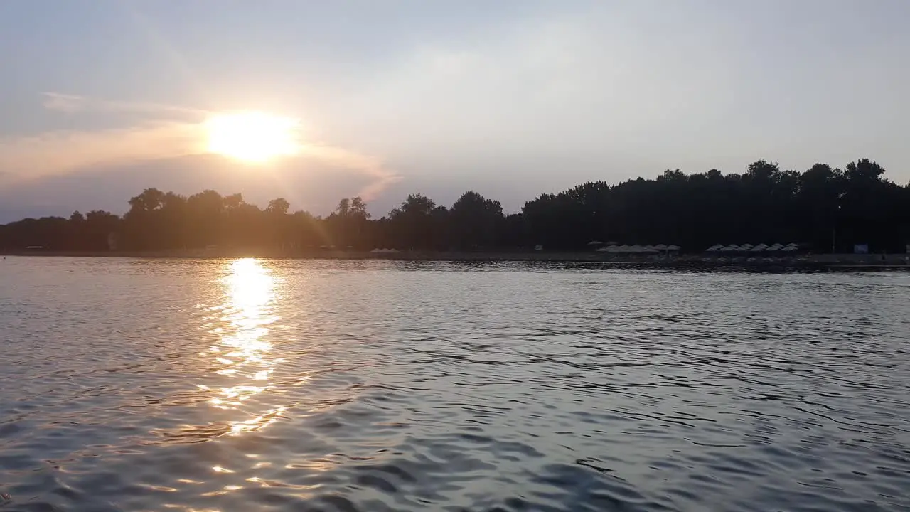 Sunset over the lake 4k