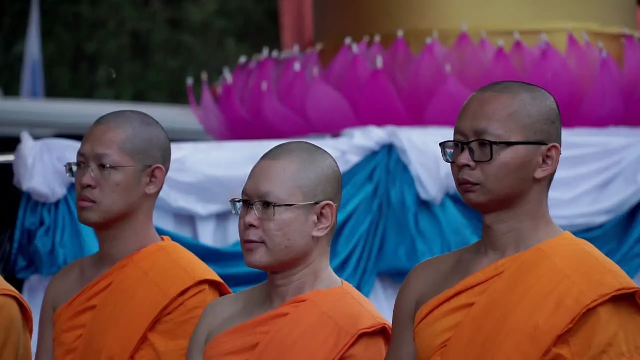 Portrait shot of three monk or bikhu on Vesak Day at Mendut Temple in asia