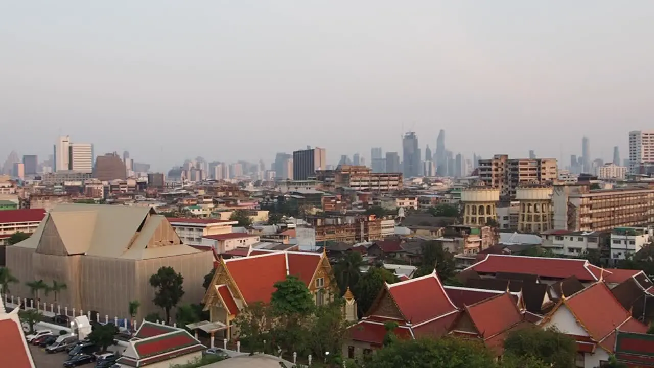 View on Bangkok city from Golden Mountain Temple Wat Saket in Thailand at sunset time South East Asia