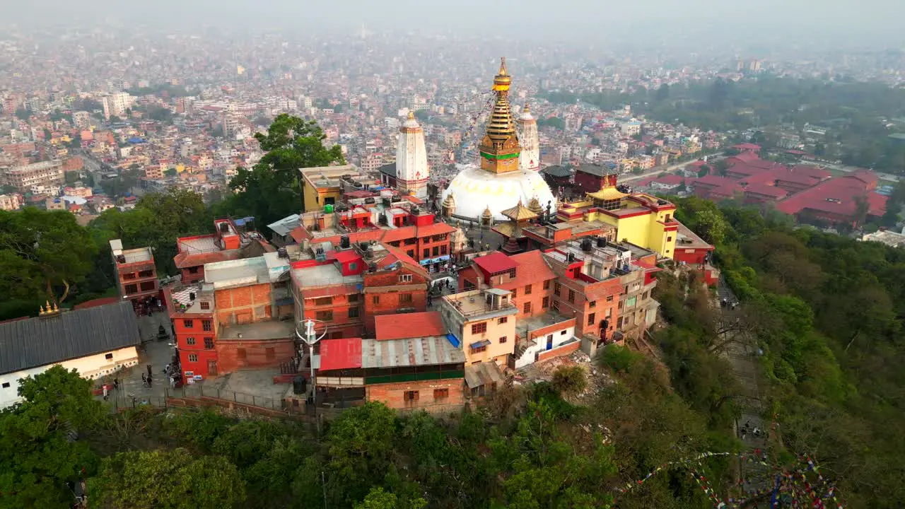 Beautiful drone shot Buddhist temple in Asia with city in background