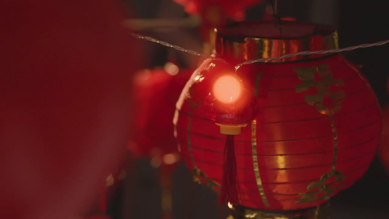 Close Up Of Decorative Lights With Chinese New Year Lanterns In Background 2