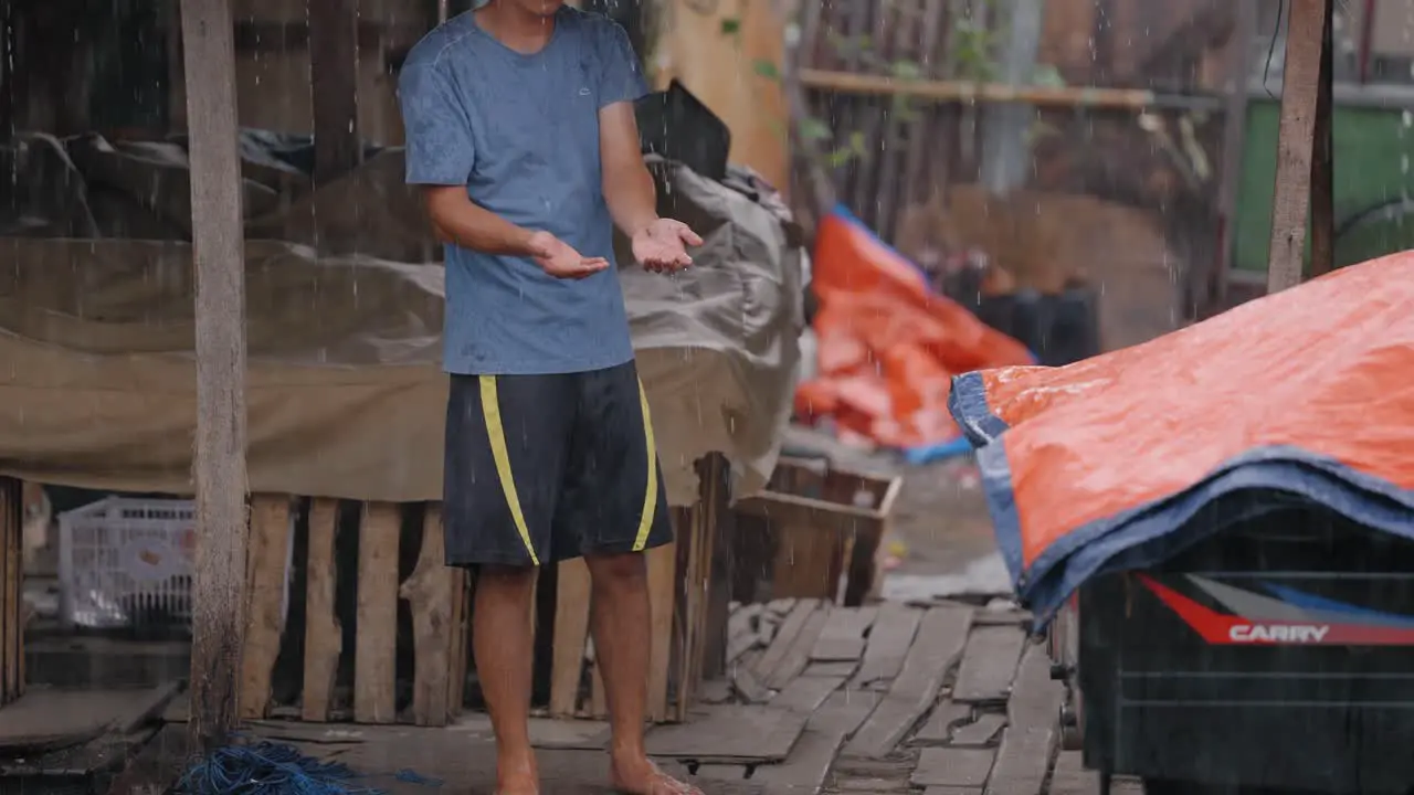 Wide Shot of Person Standing In the Rain