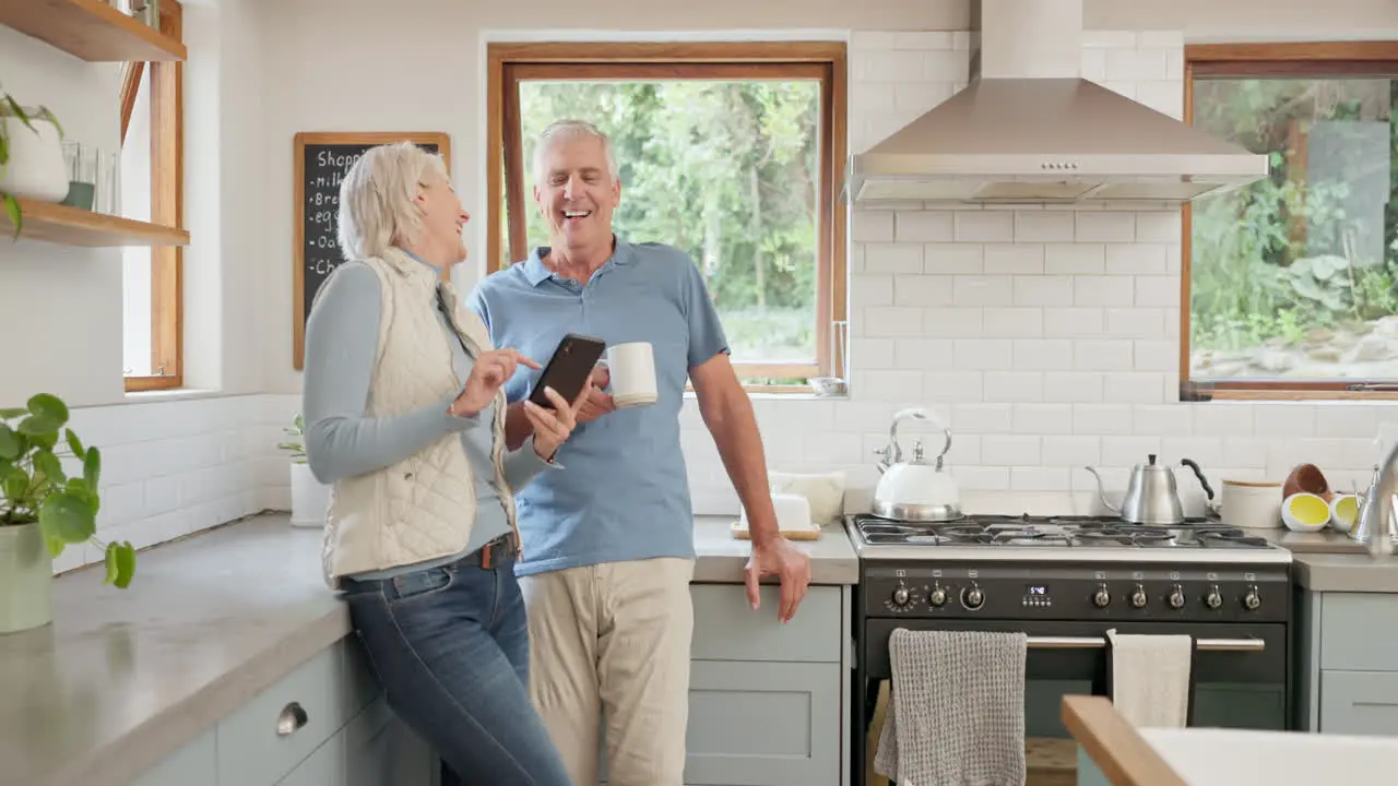 Phone coffee and senior couple in kitchen