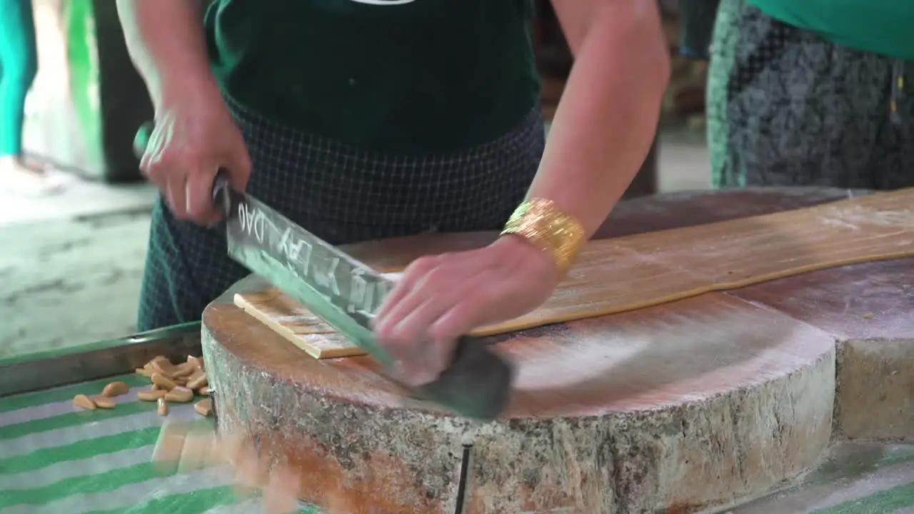 Chopping of coconut candy @ mekong delta