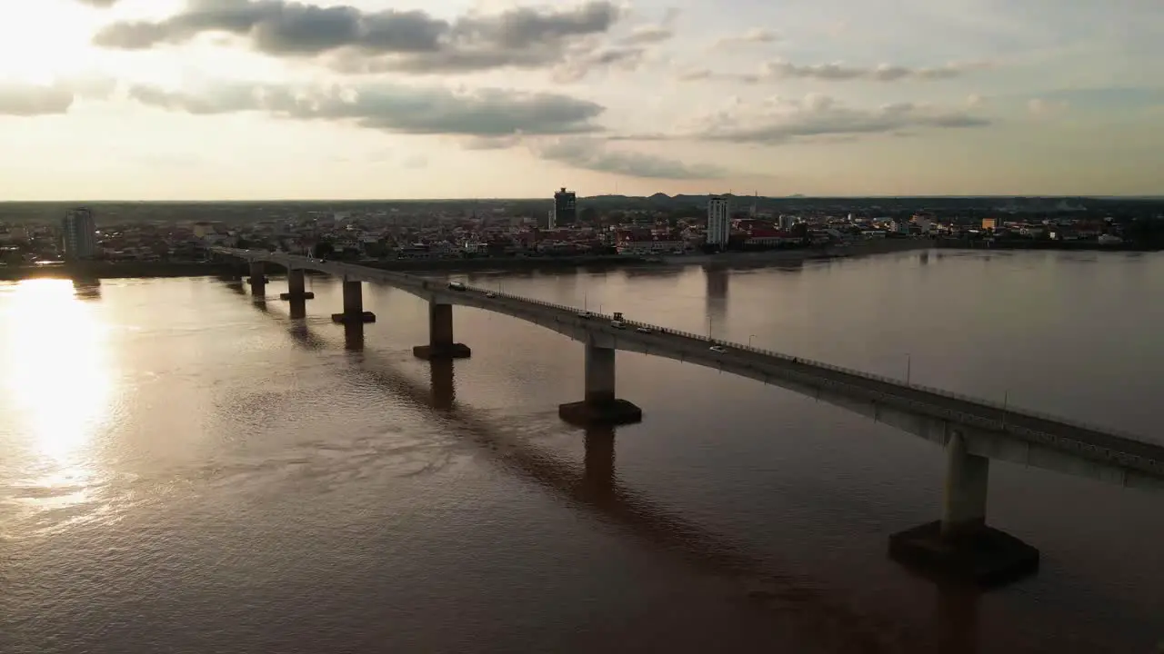 Kizuna bridge with traffic over the mighty Mekong drone lift shot