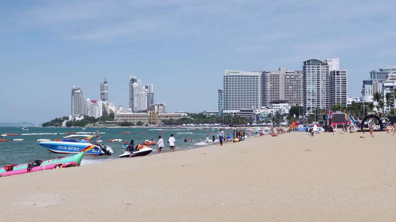 Beach City Pattaya busy with tourists from different parts of the world enjoying the beach during this holiday season condominiums and hotels can be seen at the background Thailand