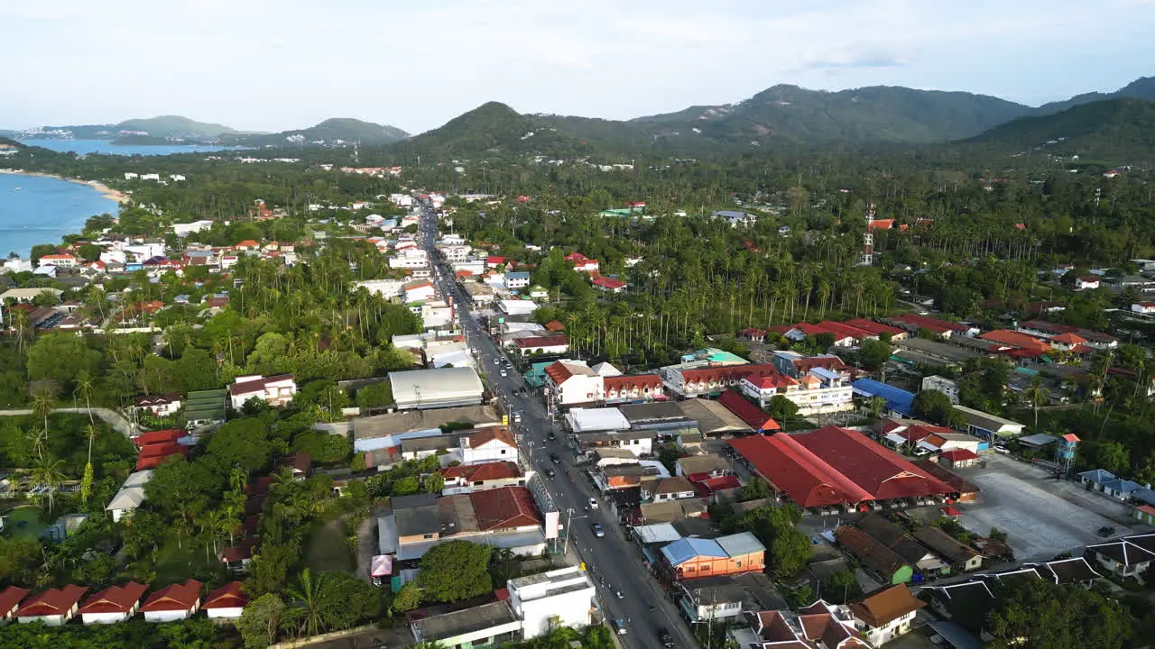 Drone fly above koh samui Thailand travel destination for holiday makers aerial sunset view of mae nam area