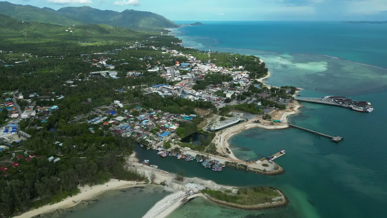 Aerial drone above Ko Phangan party island in Thailand with the gulf and scenic seascape travel holiday destination in south east asia