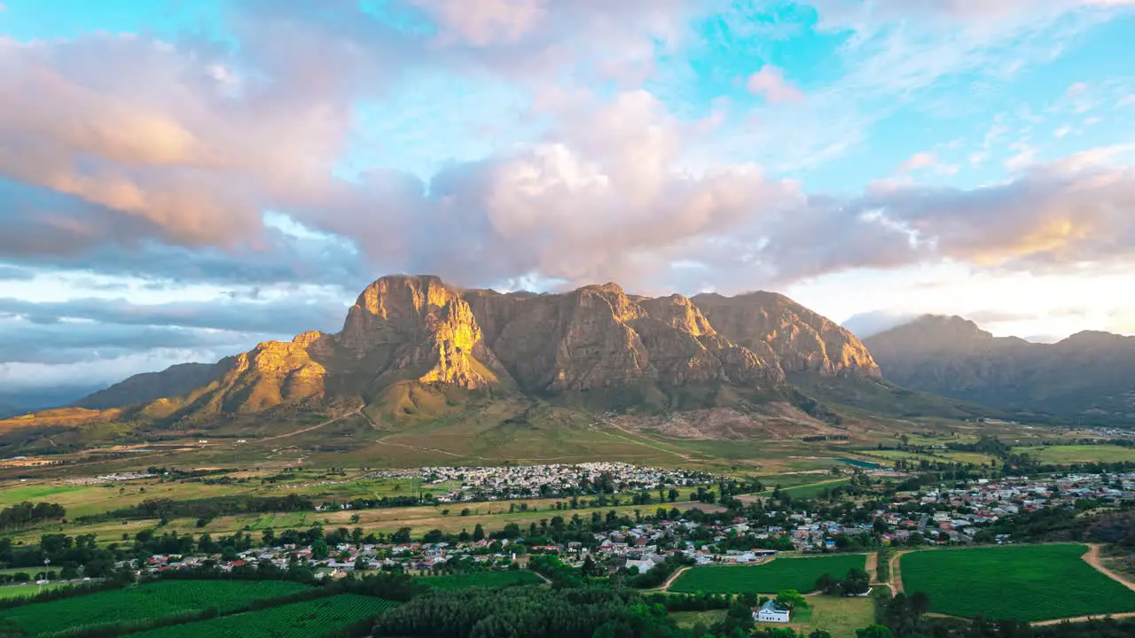 ndulge in the breathtaking allure of South Africa's mountains as you witness the ever-changing patterns of moving clouds and the stunning green vistas in this mesmerizing hyperlapse footage