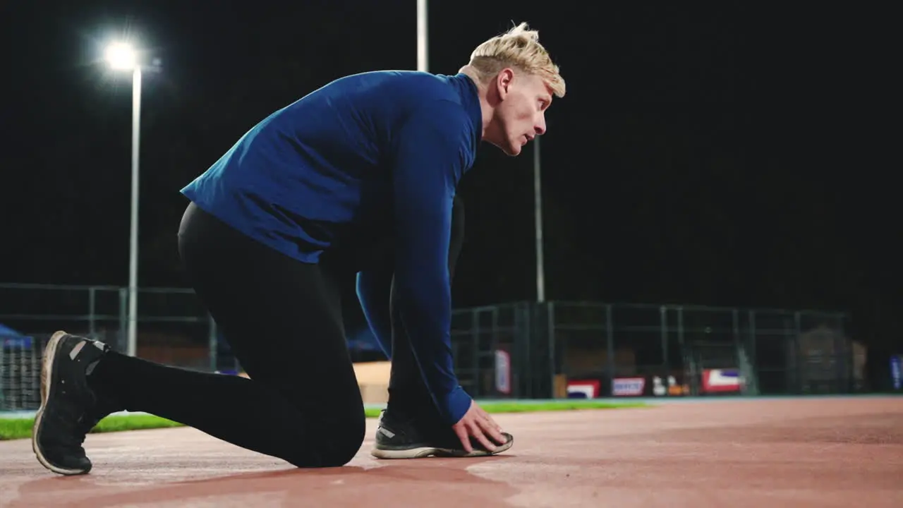 Sportive Blond Man Tying His Shoelaces And Running