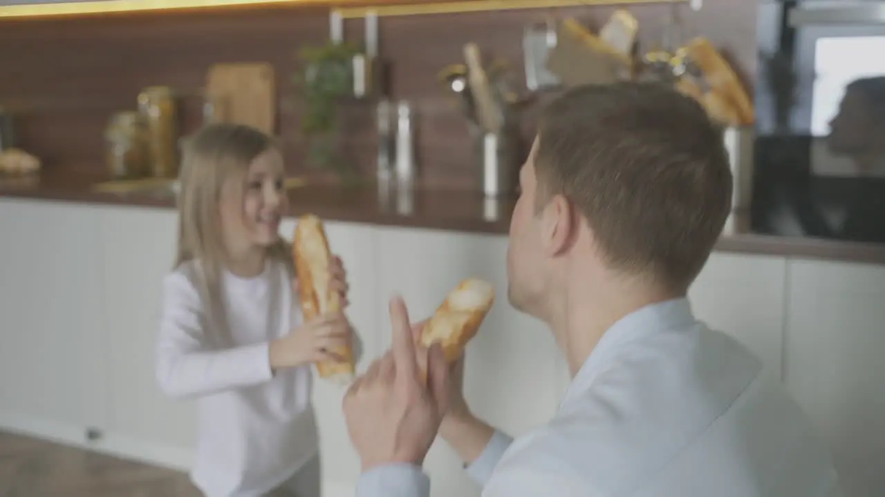 Funny Dad And Daughter Sing Dance And Play With Food At Home