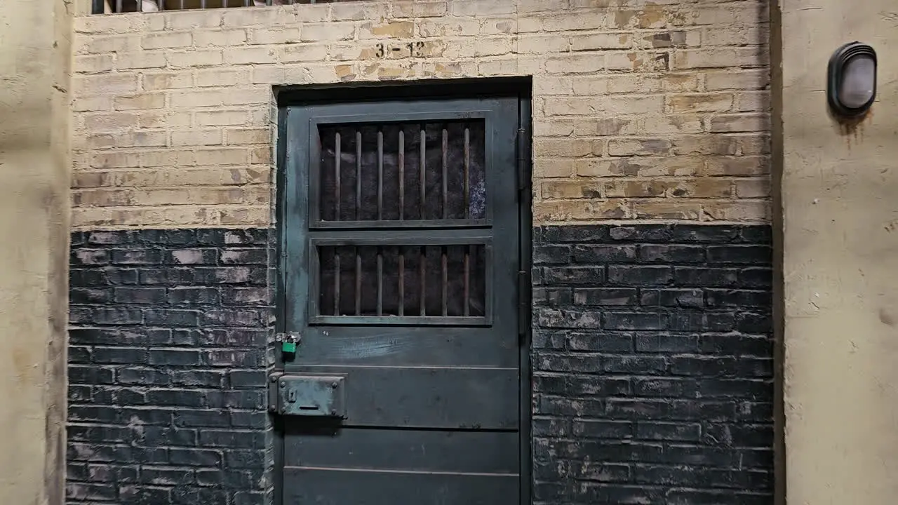 Walking Towards LOcked Door of Old Korean Prison Cell at Iksan Film Drama Set