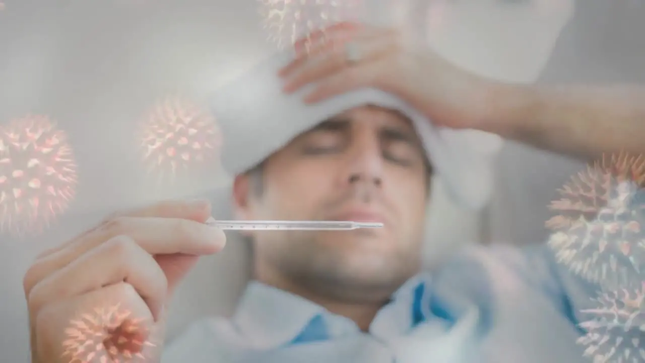 Man checking fever on thermometer and bacterial cell 4k