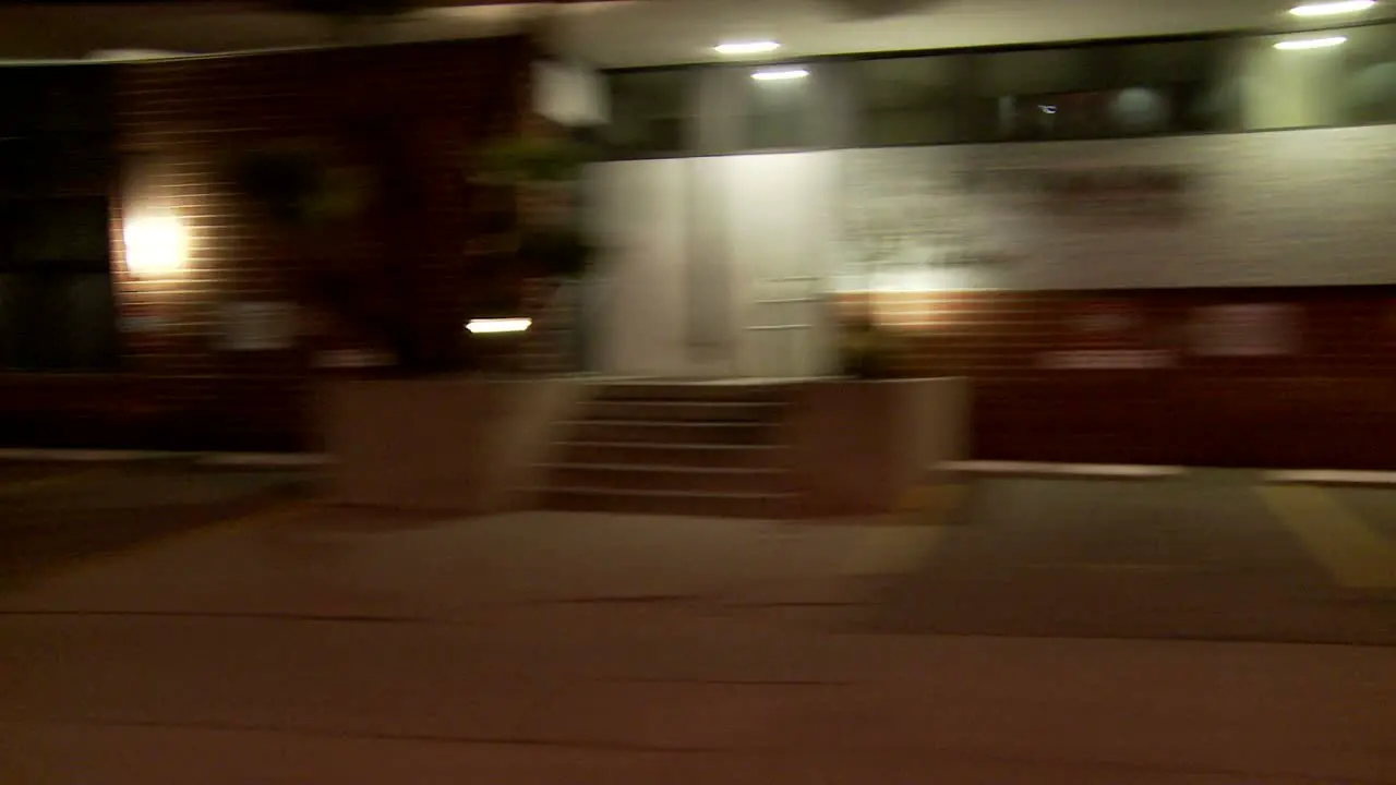 A Car Travels Along A Street At Night In Santa Monica California As Seen Through The Side Window 4