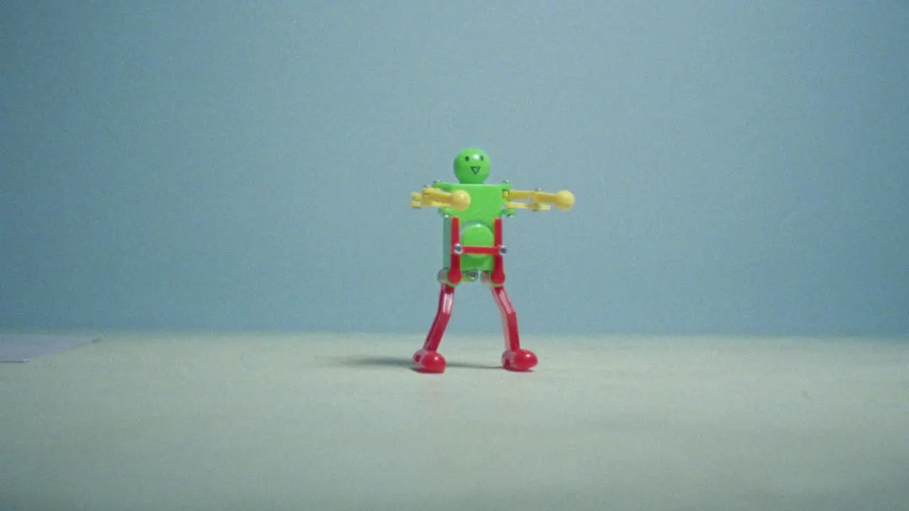 16mm film of dancing toy robot