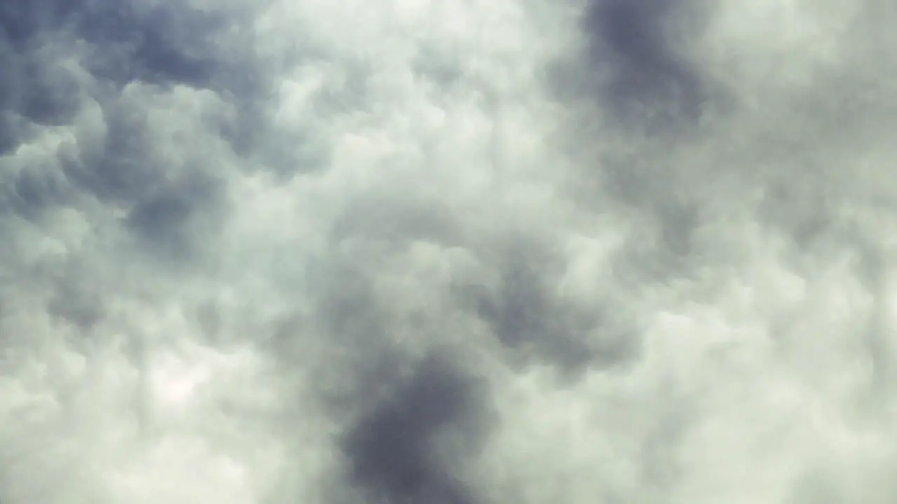 Weird Storm white Clouds in the dark sky