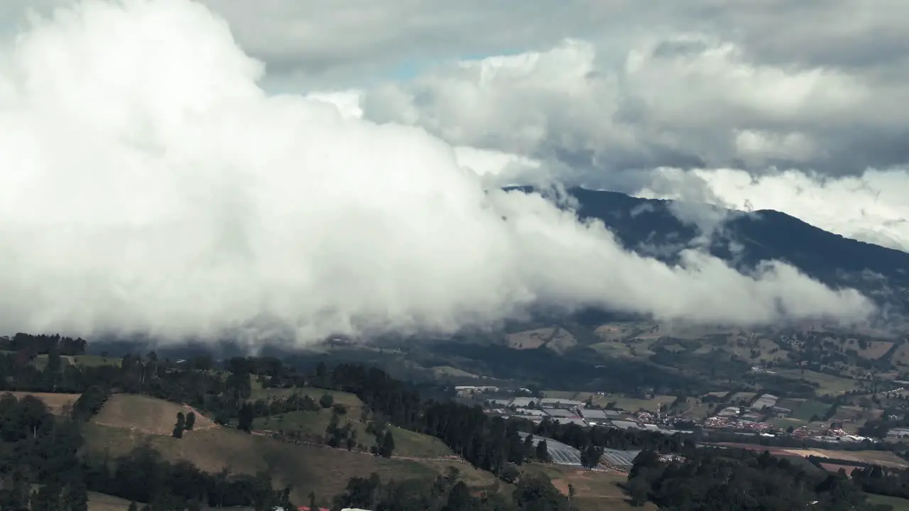 Drone parallax shot of Costa Rica highland plains and rural valley landscape