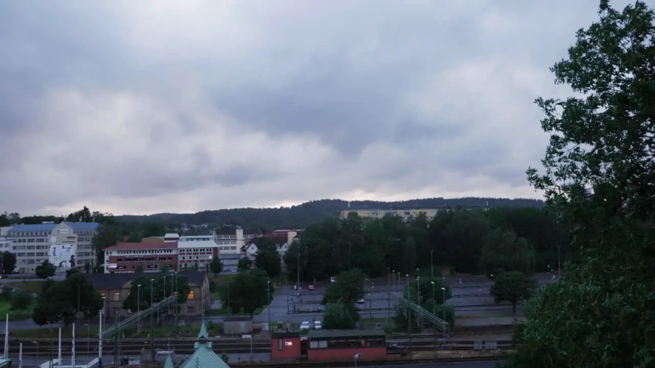 Landscape Shot of Boras Sweden at The Central Station and The Forest In The Background on a Grey Cloudy Evening