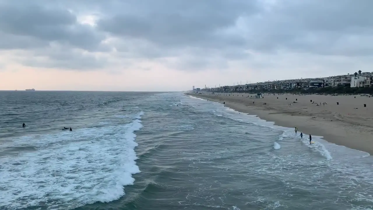 waves crash against local beach