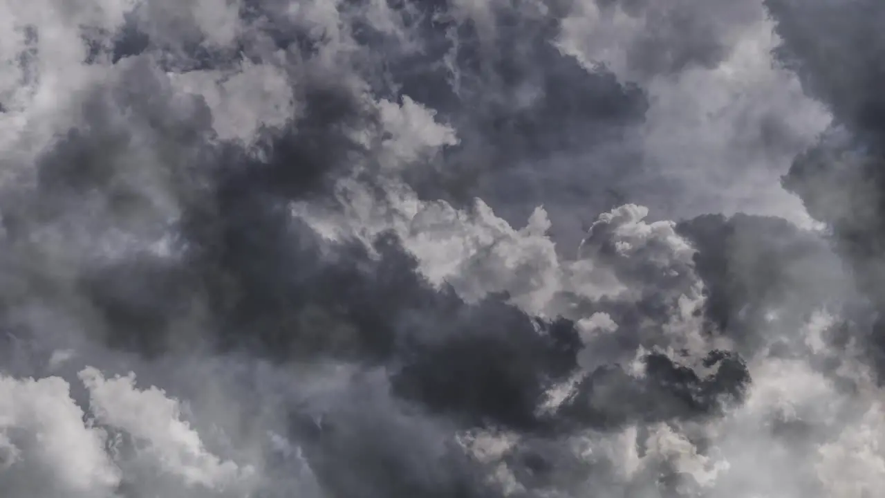 point of view thick and moving cumulonimbus clouds accompanied by a thunderstorm