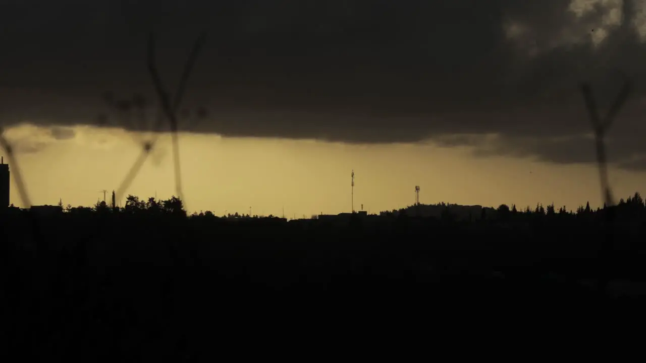 Silhouette of Jerusalem forest in a cloudy day Time-lapse