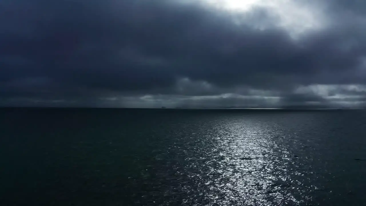 Dark and brooding skies on a cloudy day near the bay and a Naval station