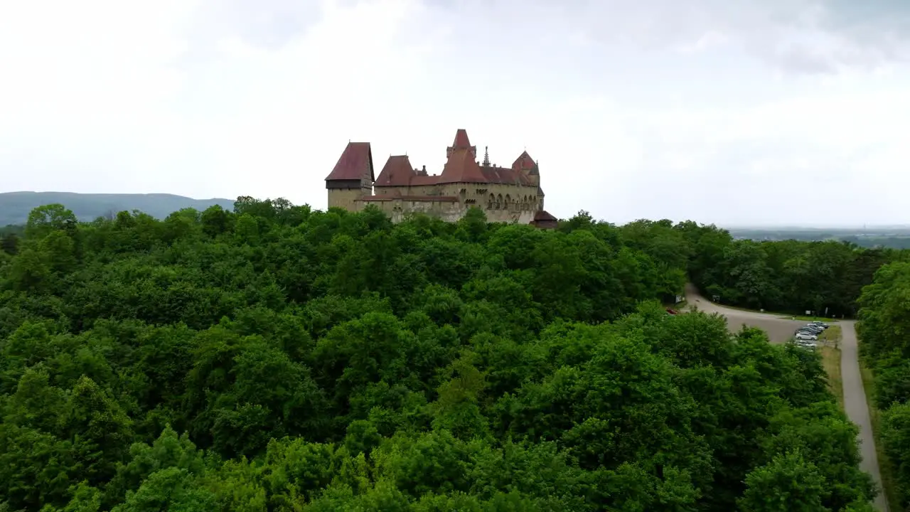 Flying Towards Kreuzenstein Castle On A Cloudy Day In Austria drone shot