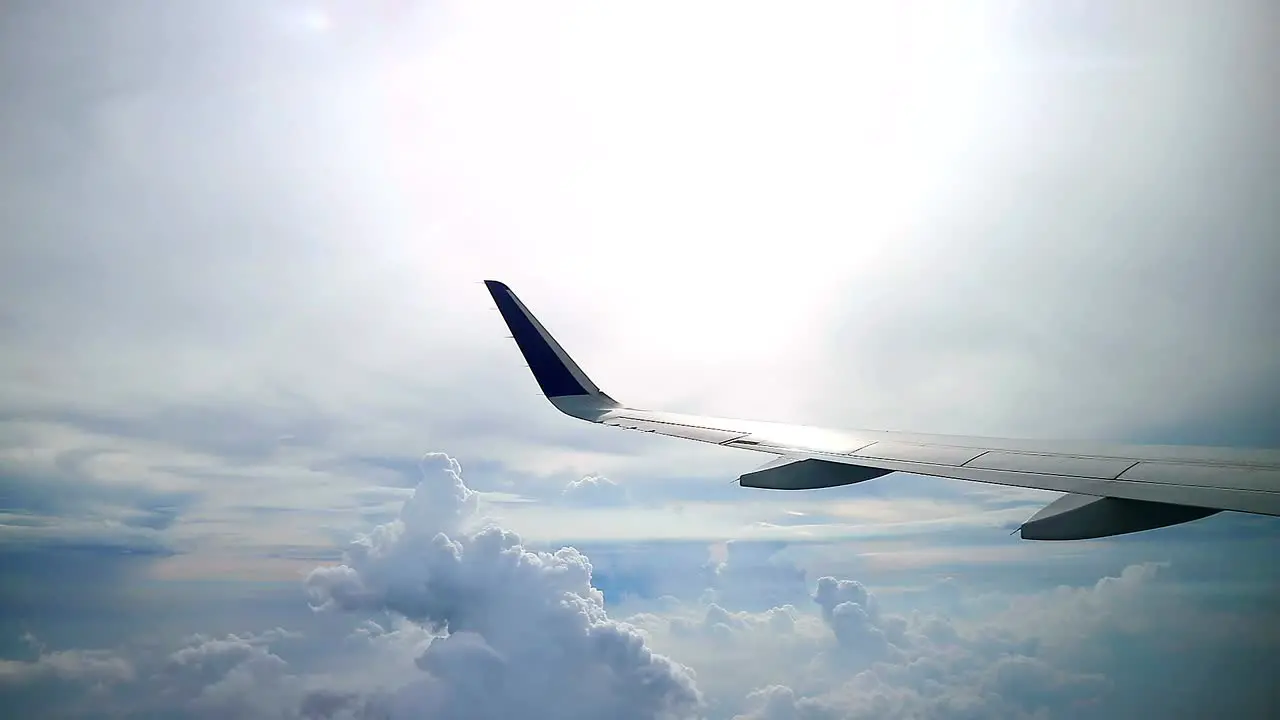 heavenly cloudy sunshine view from commercial airplane windows